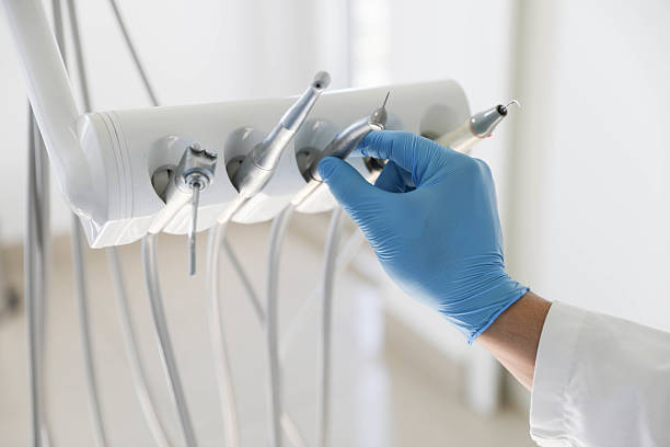 Professional Tooth Extraction technician working in Newnan, GA